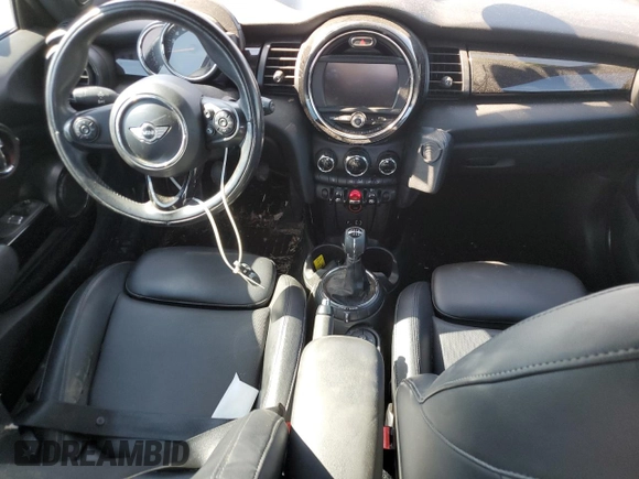 2016 MINI Hardtop S with VIN WMWXP7C55G3B49216, listed as a Copart auction lot 50579275 with 107,977 mi miles and Salvage Title. Bid and sale history available at DreamBid. Image 8.