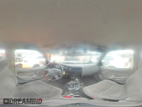 2004 Toyota Tacoma z VIN 5TEWN72NX4Z405026, wystawiony jako Copart lot #49938535 z przebiegiem 171 082 mil mil oraz Szkoda całkowita • Salvage title. Historia ofert i sprzedaży dostępna na DreamBid. Obrazek 13.