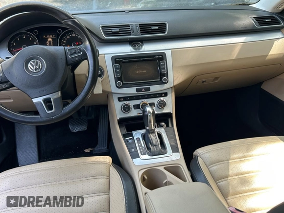 2013 Volkswagen CC Sport with VIN WVWBP7AN3DE504851, listed as a Copart auction lot 54958815 with 104,533 mi miles and Salvage Title. Bid and sale history available at carsss.com. Image 9.