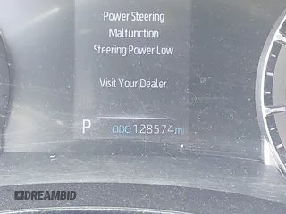 2021 Toyota Highlander L with VIN 5TDZZRAH6MS034453, listed as a IAAI auction lot 41779805 with 128,574 mi miles and . Bid and sale history available at DreamBid. Image 16.