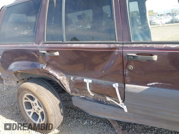 1996 Jeep Grand Cherokee Laredo with VIN 1J4GZ58S2TC262980, listed as a IAAI auction lot 41949514 with 269,674 mi miles and . Bid and sale history available at DreamBid. Image 6.