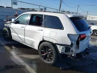 2017 Jeep Grand Cherokee SRT with VIN 1C4RJFDJ7HC600227, listed as a IAAI auction lot 41390600 with 96,841 mi miles. Bid and sale history available at carsss.com. Image 3.