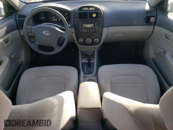 2009 Kia Spectra LX with VIN KNAFE221895659552, listed as a Copart auction lot 82555924 with 114,704 mi miles and Salvage Title. Bid and sale history available at carsss.com. Image 8.