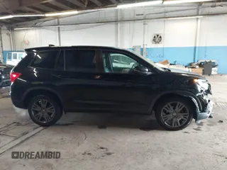 2020 Honda Passport EX-L z VIN 5FNYF8H5XLB005518, wystawiony jako IAAI lot #42021512 z przebiegiem 79 573 mil mil oraz . Historia ofert i sprzedaży dostępna na DreamBid. Obrazek 13.