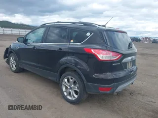 2013 Ford Escape SEL with VIN 1FMCU9H99DUA94169, listed as a IAAI auction lot 41937675 with 106,405 mi miles. Bid and sale history available at carsss.com. Image 3.