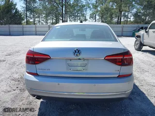 2017 Volkswagen Passat 1.8T SE w/Technology with VIN 1VWGT7A3XHC025096, listed as a IAAI auction lot 41891297 with 124,375 mi miles. Bid and sale history available at carsss.com. Image 16.