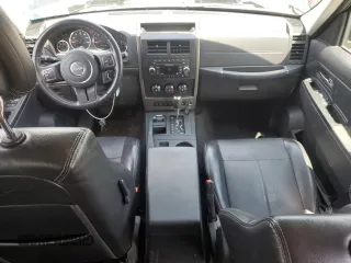 2012 Jeep Liberty Sport with VIN 1C4PJMAK9CW182088, listed as a Copart auction lot 61964575 with 107,911 mi miles and Salvage title. Bid and sale history available at DreamBid. Image 8.