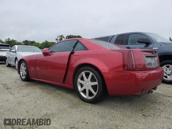 2005 Cadillac XLR z VIN 1G6YV34AX55600837, wystawiony jako Copart lot #75055604 z przebiegiem Nie podano mil oraz Szkoda całkowita • Salvage title. Historia ofert i sprzedaży dostępna na DreamBid. Obrazek 2.