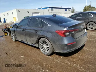 2023 Honda Civic Sedan Touring with VIN 2HGFE1F97PH001905, listed as a Copart auction lot 50881945 with 0 mi miles and Salvage Title. Bid and sale history available at carsss.com. Image 2.