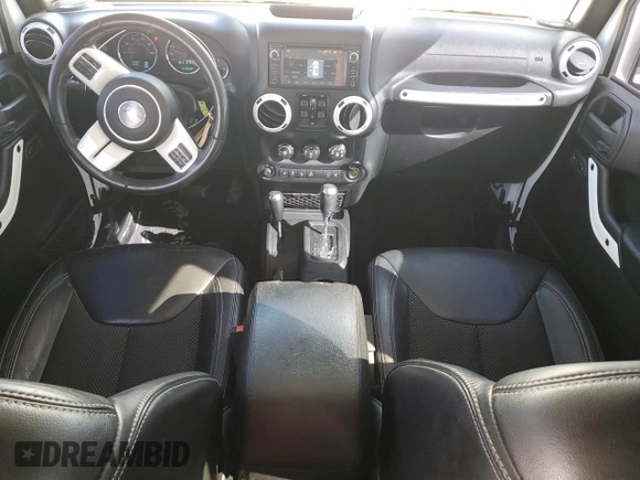 2015 Jeep Wrangler Unlimited Sahara with VIN 1C4BJWEG6FL614671, listed as a Copart auction lot 86052284 with 92,894 mi miles and Salvage title. Bid and sale history available at DreamBid. Image 8.