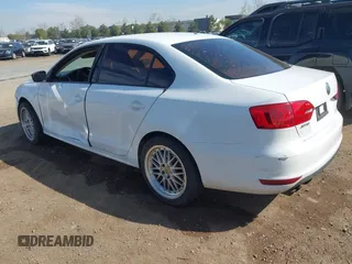 2014 Volkswagen Jetta Sedan S with VIN 3VW1K7AJ7EM439342, listed as a IAAI auction lot 41626534 with 184,935 mi miles. Bid and sale history available at carsss.com. Image 3.