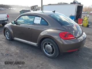 2013 Volkswagen Beetle 2.5L с VIN 3VWJP7AT1DM601306, выставлен на аукционе IAAI как лот 41846490 с пробегом 117 082 миль миль и . История ставок и продаж доступна на DreamBid. Изображение 3.