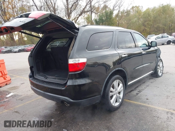 2013 Dodge Durango Crew with VIN 1C4RDHDG8DC592706, listed as a IAAI auction lot 40745114 with 95,757 mi miles and . Bid and sale history available at DreamBid. Image 4.