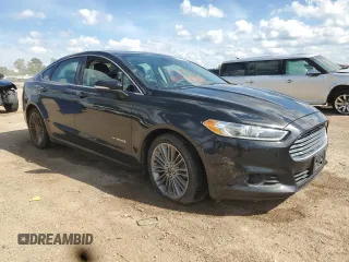 2013 Ford Fusion SE Hybrid с VIN 3FA6P0LU2DR181215, выставлен на аукционе Copart как лот 62474965 с пробегом 149 492 миль миль и Списание • Salvage title. История ставок и продаж доступна на DreamBid. Изображение 4.