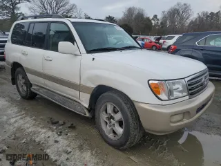 2004 Toyota Land Cruiser with VIN JTEHT05JX42067402, listed as a Copart auction lot 88976025 with 350,518 mi miles and Salvage Title. Bid and sale history available at carsss.com. Image 4.