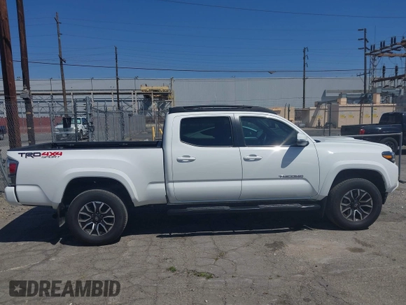 2023 Toyota Tacoma SR5 z VIN 3TMDZ5BN3PM160975, wystawiony jako IAAI lot #42024778 z przebiegiem 41 621 mil mil oraz . Historia ofert i sprzedaży dostępna na DreamBid. Obrazek 12.