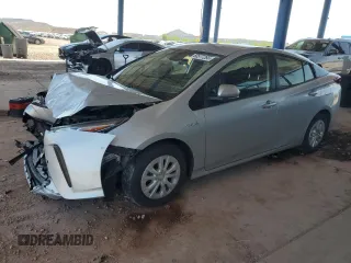 2021 Toyota Prius L Eco with VIN JTDKAMFU4M3140693, listed as a Copart auction lot 60577265 with 75,131 mi miles and Salvage title. Bid and sale history available at DreamBid. Image 1.