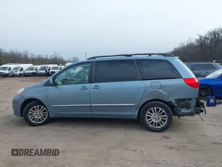 2008 Toyota Sienna XLE with VIN 5TDZK22C18S102498, listed as a IAAI auction lot 41623508 with 214,485 mi miles. Bid and sale history available at carsss.com. Image 14.