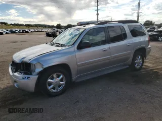 2005 GMC Envoy SLT with VIN 1GKET16M656181157, listed as a Copart auction lot 72980874 with 243,975 mi miles and Salvage Title. Bid and sale history available at DreamBid. Image 1.