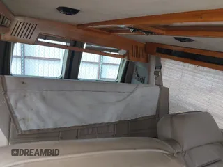 1996 Ford Econoline Cargo z VIN 1FDEE14H2THB68737, wystawiony jako IAAI lot #41919471 z przebiegiem Nie podano mil oraz . Historia ofert i sprzedaży dostępna na DreamBid. Obrazek 12.