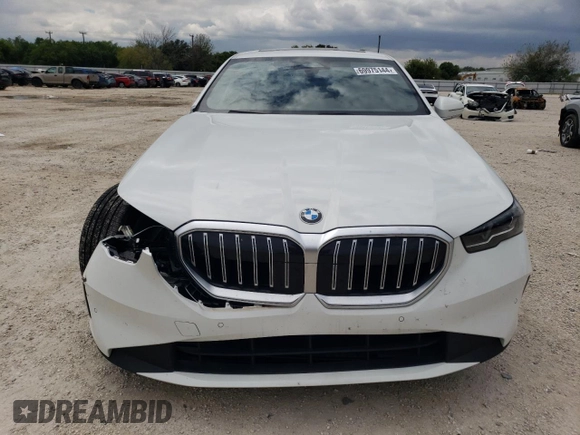 2024 BMW 5 Series 530i with VIN WBA43FJ03RCR61887, listed as a Copart auction lot 69975144 with 2,737 mi miles and Salvage Title. Bid and sale history available at carsss.com. Image 5.