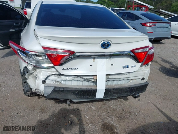 2015 Toyota Camry Hybrid LE with VIN 4T1BD1FK7FU142175, listed as a IAAI auction lot 41958486 with 120,013 mi miles. Bid and sale history available at carsss.com. Image 6.