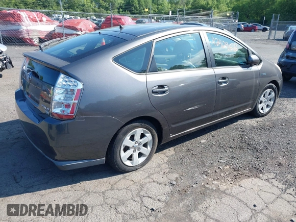 2007 Toyota Prius z VIN JTDKB20U473225645, wystawiony jako IAAI lot #42409516 z przebiegiem 154 050 mil mil oraz . Historia ofert i sprzedaży dostępna na DreamBid. Obrazek 4.