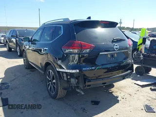 2019 Nissan Rogue SL with VIN 5N1AT2MTXKC813158, listed as a IAAI auction lot 41665354 with 62,605 mi miles and . Bid and sale history available at DreamBid. Image 3.