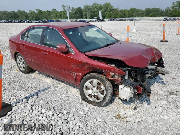 2009 Kia Optima LX z VIN KNAGE228795334599, wystawiony jako Copart lot #59276515 z przebiegiem 180 399 mil mil oraz Szkoda całkowita • Salvage title. Historia ofert i sprzedaży dostępna na DreamBid. Obrazek 4.