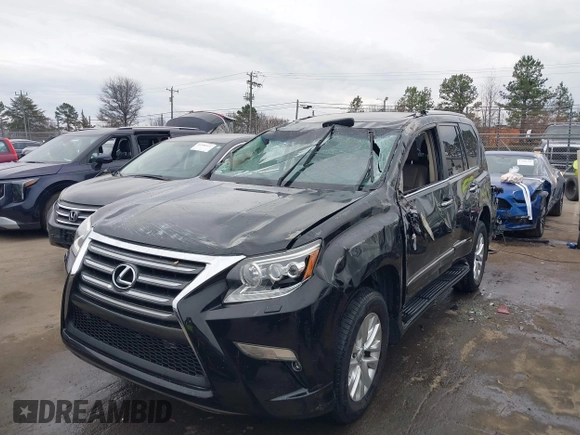 2014 Lexus GX 460 with VIN JTJBM7FX6E5073973, listed as a IAAI auction lot 41610332 with 128,870 mi miles. Bid and sale history available at carsss.com. Image 6.