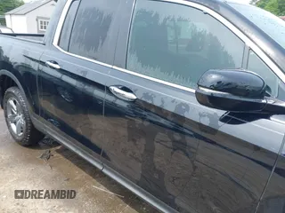 2023 Honda Ridgeline RTL-E with VIN 5FPYK3F76PB042100, listed as a IAAI auction lot 42274861 with 16,822 mi miles and . Bid and sale history available at DreamBid. Image 13.