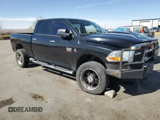 2012 Ram 2500 Big Horn with VIN 3C6UD5DL5CG236237, listed as a Copart auction lot 48310095 with 153,977 mi miles and Salvage title. Bid and sale history available at DreamBid. Image 4.