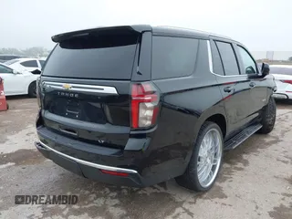 2021 Chevrolet Tahoe LT with VIN 1GNSCNKDXMR172381, listed as a IAAI auction lot 42168263 with 89,112 mi miles and . Bid and sale history available at DreamBid. Image 4.