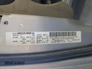 2011 Dodge Grand Caravan Crew with VIN 2D4RN5DG5BR755489, listed as a Copart auction lot 51074595 with 193,259 mi miles and Salvage Title. Bid and sale history available at DreamBid. Image 14.