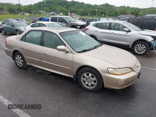 2002 Honda Accord EX z VIN 1HGCG56652A025637, wystawiony jako IAAI lot #42216263 z przebiegiem 194 988 mil mil oraz . Historia ofert i sprzedaży dostępna na DreamBid. Obrazek 1.