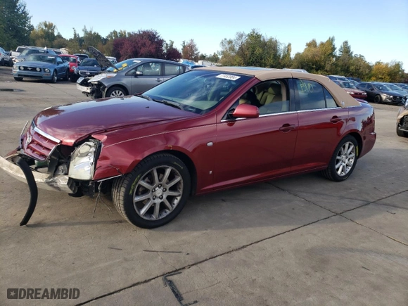 2006 Cadillac STS with VIN 1G6DC67A160153430, listed as a Copart auction lot 77452004 with 128,710 mi miles and Salvage Title. Bid and sale history available at carsss.com. Image 1.
