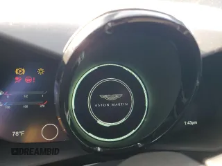 2023 Aston Martin Vantage z VIN SCFSMGBW8PGP07034, wystawiony jako Copart lot #83069914 z przebiegiem Nie podano mil oraz Szkody całkowita. Historia ofert i sprzedaży dostępna na DreamBid. Obrazek 9.