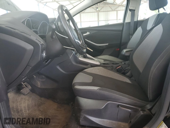 2012 Ford Focus SE with VIN 1FAHP3F29CL346226, listed as a Copart auction lot 61029345 with 172,533 mi miles and Salvage title. Bid and sale history available at DreamBid. Image 7.
