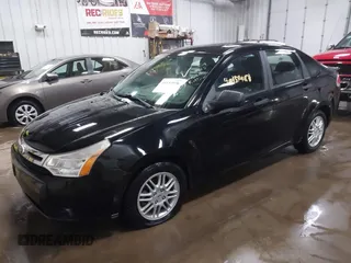 2011 Ford Focus SE with VIN 1FAHP3FN5BW192119, listed as a IAAI auction lot 41193926 with 113,435 mi miles. Bid and sale history available at carsss.com. Image 2.