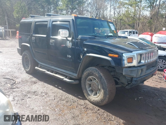 2003 Hummer H2 with VIN 5GRGN23U33H144379, listed as a IAAI auction lot 41452982 with 227,746 mi miles. Bid and sale history available at carsss.com. Image 1.
