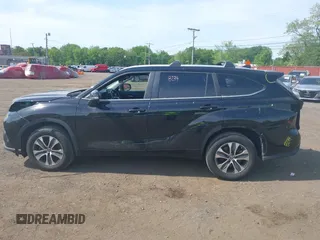 2023 Toyota Highlander L with VIN 5TDKDRBHXPS030361, listed as a IAAI auction lot 42230419 with 59,404 mi miles and . Bid and sale history available at DreamBid. Image 14.