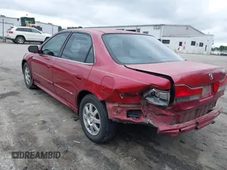 2002 Honda Accord EX z VIN 1HGCG56632A038404, wystawiony jako IAAI lot #42370161 z przebiegiem 262 308 mil mil oraz . Historia ofert i sprzedaży dostępna na DreamBid. Obrazek 3.