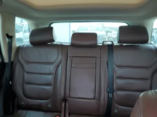 2013 Volkswagen Touareg Sport с VIN WVGEP9BP9DD003974, выставлен на аукционе Copart как лот 75106234 с пробегом 211 323 миль миль и Чистый • Clean title. История ставок и продаж доступна на DreamBid. Изображение 10.