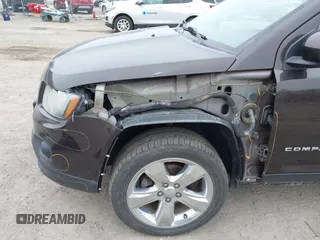 2014 Jeep Compass Latitude with VIN 1C4NJDEB5ED731057, listed as a IAAI auction lot 41938769 with 175,289 mi miles and . Bid and sale history available at carsss.com. Image 6.