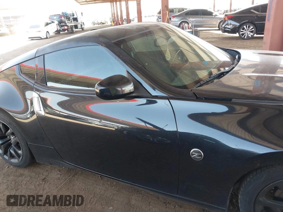2015 Nissan 370Z Sport with VIN JN1AZ4EH3FM442775, listed as a IAAI auction lot 41960249 with 125,780 mi miles and . Bid and sale history available at DreamBid. Image 13.
