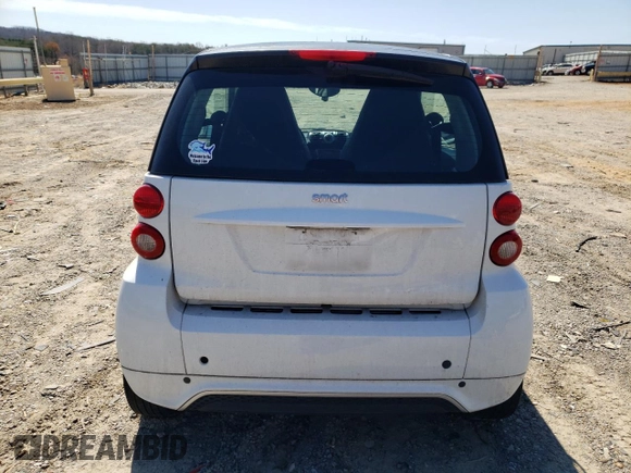 2015 Smart fortwo Passion z VIN WMEEJ3BA3FK809467, wystawiony jako Copart lot #50590865 z przebiegiem 83 821 mil mil oraz Szkody całkowita. Historia ofert i sprzedaży dostępna na DreamBid. Obrazek 6.