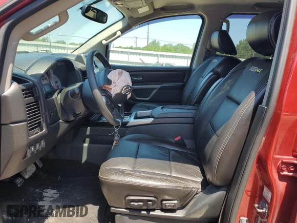 2015 Nissan Titan Pro-4X with VIN 1N6BA0EC5FN506358, listed as a Copart auction lot 56671205 with 153,712 mi miles and Salvage title. Bid and sale history available at DreamBid. Image 7.