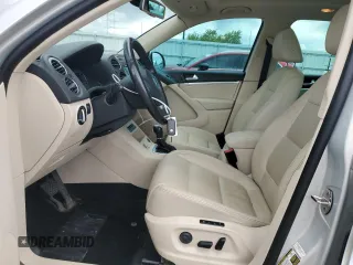 2013 Volkswagen Tiguan SE с VIN WVGBV7AXXDW548780, выставлен на аукционе Copart как лот 55157985 с пробегом 92 767 миль миль и Списание • Salvage title. История ставок и продаж доступна на DreamBid. Изображение 7.