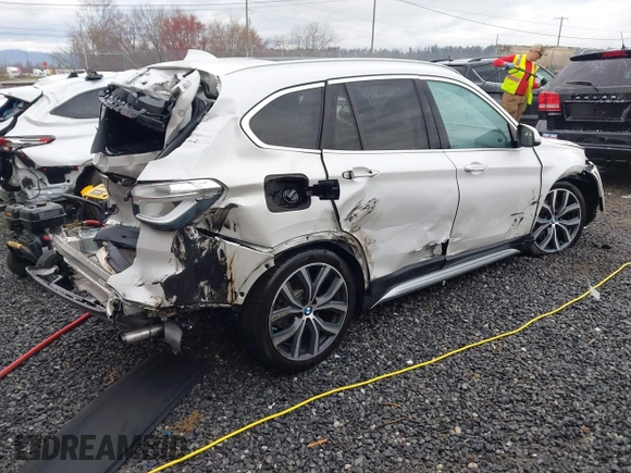2017 BMW X1 xDrive28i with VIN WBXHT3C36H5F74818, listed as a IAAI auction lot 41853836 with 71,735 mi miles and . Bid and sale history available at DreamBid. Image 4.