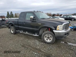 2003 Ford Super Duty F-250 XL with VIN 1FTNX21L13EB63351, listed as a Copart auction lot 85092674 with 265,515 mi miles and Salvage Title. Bid and sale history available at carsss.com. Image 4.
